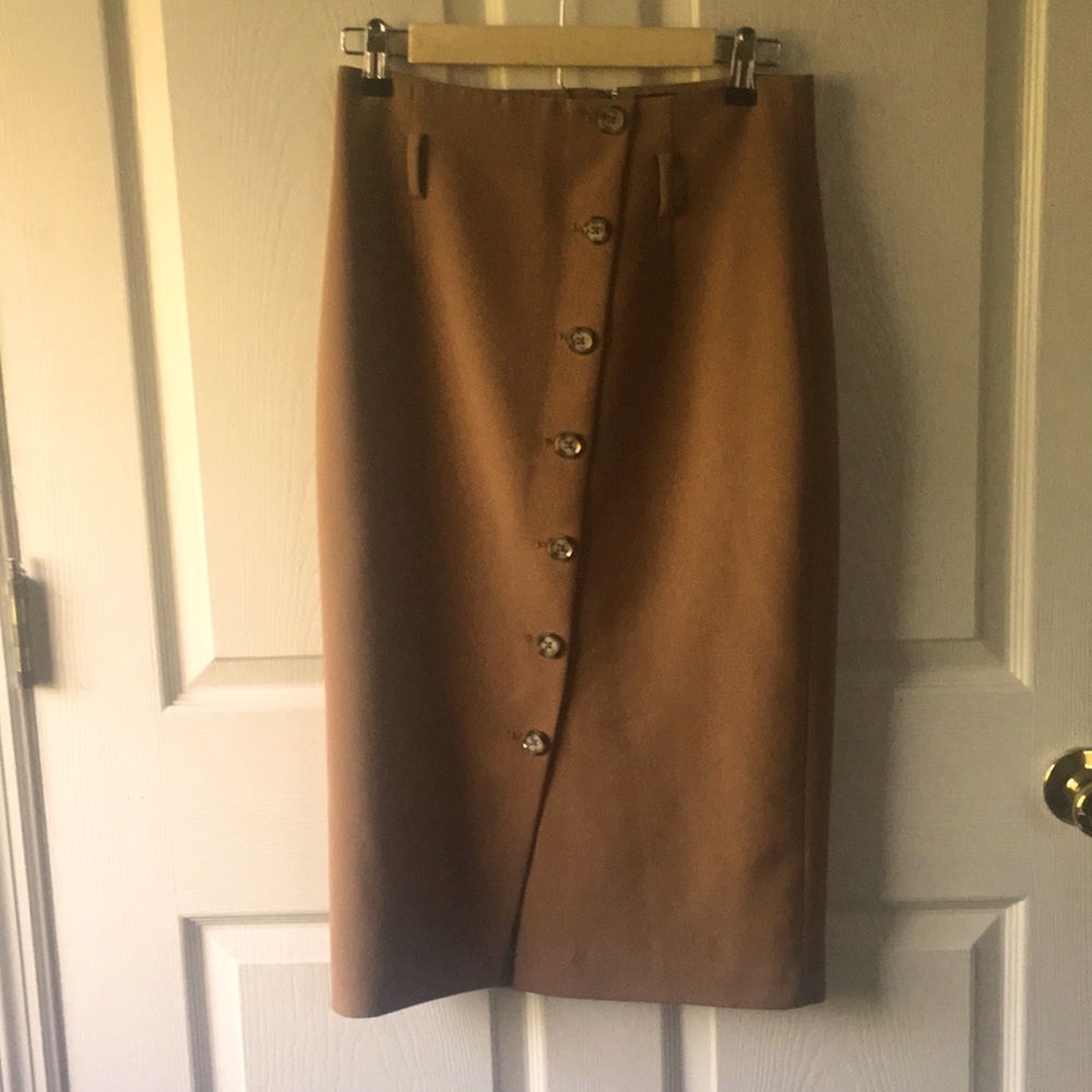 Button front pencil skirt. Camel colored. Size 4
